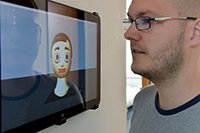 Bei der Tagung geht es um künstliche „Agenten“, handlungsfähige Systeme wie Flobi, der als Avatar (Bild) und als Roboter eingesetzt wird. Foto: CITEC/ Universität Bielefeld