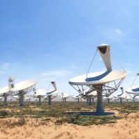 The SKA will be a collection of thousands of radio receivers and dishes spread across two sites in South Africa and Western Australia. Simulation: SKA Organisation