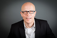 Bild: Dr. Hans-Georg Kühne hat die musikalische Seite der Geschichte im Blick. Foto: Ralph Pache/Bielefeld Marketing