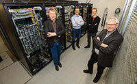 For the de.NBI, they are coordinating computing power and services for bioinformatics in Germany (from left to right): Professor Dr Andreas Tauch, Professor Dr Alexander Sczyrba, Professor Dr Jens Stoye, and Professor Dr Alfred Pühler. Photo: Bielefeld University/M.-D. Müller